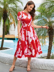 Robe mi-longue imprimée à col rond et manches volantées