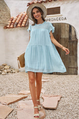 Robe à col volanté et manches flottantes