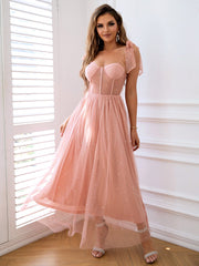 Robe à épaules nouées avec superposition de maille et strass