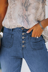 Skinny Jeans mit Knopfleiste und Taschen