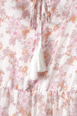 Gestuftes Kleid mit Blumenmuster, Quaste und Krawatte