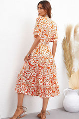 Robe mi-longue à col fleuri et manches bouffantes