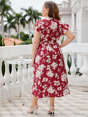 Robe mi-longue à col surplis et taille nouée à fleurs grande taille
