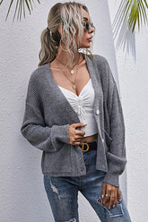Cardigan boutonné en maille côtelée à épaules tombantes