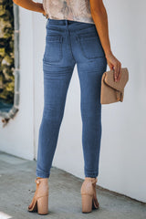 Skinny Jeans mit Knopfleiste und Taschen