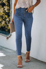 Skinny Jeans mit Knopfleiste und Taschen