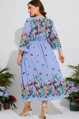 Robe mi-longue fleurie grande taille à col en V et manches trois-quarts