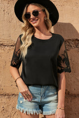 Chemisier à manches mi-longues et col rond
