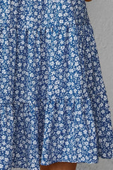 Robe fleurie à col rond et manches volantées