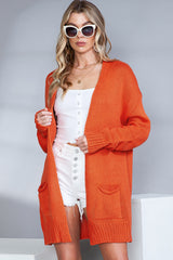 Orangefarbene Strickjacke mit offener Vorderseite und Taschen