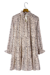 Robe imprimée à volants et col noué