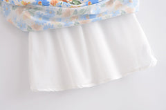 Robe longue imprimée à lacets et col en V