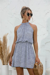 Mini-robe fleurie sans manches nouée