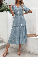 Robe imprimée à volants et pompons