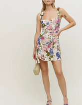 Schmal geschnittenes Kleid mit Blumenmuster und Bindebändern