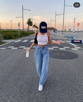 Hohe Taille, weites Bein, hängender gerader Rücken, lockere Löcher, schlankmachende Jeanshose
