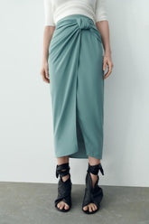 Jupe plissée taille haute style hipster, style streetwear, fendue, passe-partout