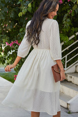 Robe à volants et pois suisses