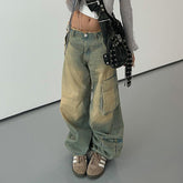 Jeans im Retro-Look mit verwaschener niedriger Taille und lockeren Taschen mit Nähten und Kanten, gerade geschnittene Street-Snap-Freizeithose