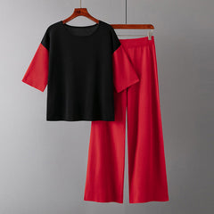 Anzug mit lockerem, farblich passendem Oberteil, lässiger, hoch taillierter, weit geschnittener Hose, zweiteiliger Anzug