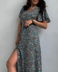 Robe fleurie fendue à la taille et à manches mi-longues