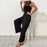 Combinaison ample noire à jambe large et à bretelles une pièce