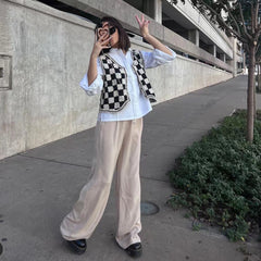 Frühe Strickweste mit V-Ausschnitt und Leinenoberfläche, Million Can Schachbrett-Karomantel mit kariertem ide-Kleinmantel