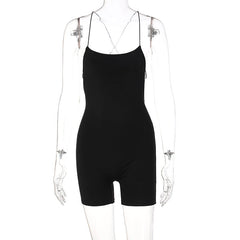 Combinaison dos nu à lacets et col nu de couleur unie