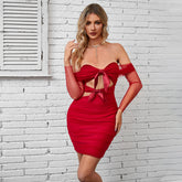 Robe rouge de Noël à manches longues et col rond avec nœud