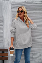 Sweat à capuche tendance avec poches amples