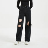 Jean taille haute déchiré et pantalon droit