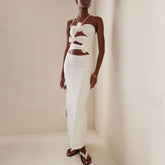 Robe longue à fleurs et coupe ajustée, dos nu, ajourée et découpée