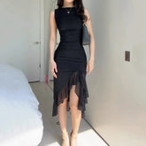 Robe moulante de couleur unie à col rond et taille serrée