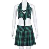 Ensemble deux pièces mini-jupe plissée à carreaux et à poitrine enveloppée