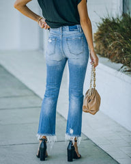 Pantalon en denim décontracté ordinaire délavé à l'eau avec bords bruts