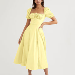 Robe longue à manches bouffantes et fente haute, couleur unie