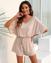 Combinaison décontractée à col en V profond et manches chauve-souris, taille ajustée et ample