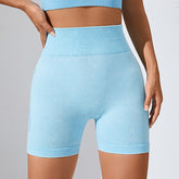 Short de fitness taille haute sans coutures, couleur pêche délavée, respirant et évacuant l'humidité, avec élastique et découpes