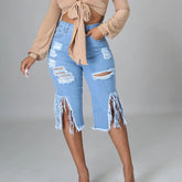 Zerrissene Stretch-Jeans mit Quasten