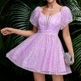 Robe courte à manches bouffantes en dentelle et maille ajourée