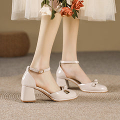 Sandales à talons épais et creux pour femmes, style printemps, à bout rond et mi-haut