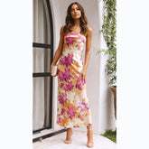Robe mi-longue à imprimé floral et poitrine enveloppante
