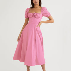 Robe longue à manches bouffantes et fente haute, couleur unie