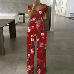 Schulterfreier Jumpsuit mit Büro-Print und kontrollierter Taille