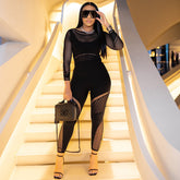 Combinaison moulante taille haute avec pantalon transparent découpé en maille