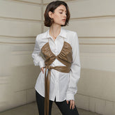 Gilet dos nu design en similicuir avec bretelles et bandeau