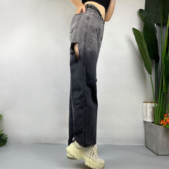 Jean déchiré à coutures dégradées de couleurs, style hipster urbain, coupe droite, pantalon large