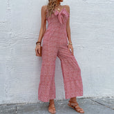 Roter Jumpsuit mit weitem Bein und schmalen Trägern