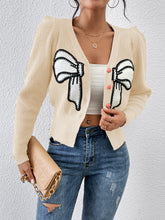 Pull cardigan court à col en tricot et nœud