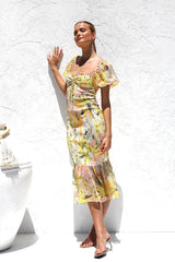 Elegantes, bedrucktes, rückenfreies Fischschwanzkleid mit Puffärmeln